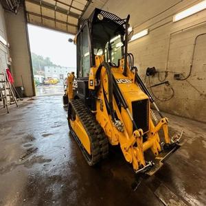 Mini-chargeuse sur chenilles JCB 1CXLT jaune avec godet frontal pour la construction - Product Image 4