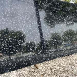 Losa de monedas de granito negro de estilo moderno duradero para encimeras, paneles de pared para suelo, paisajismo, acabado pulido, varios estilos - Product Image 1