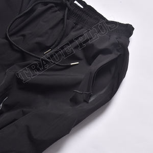 Pantalones de nieve con estampado de llama reflectante negro OEM con presillas de cinturón ajustables y ajuste holgado para deportes de invierno y moda - Product Image 4