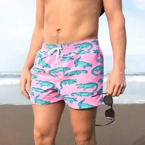 Usine directe 100% coton hommes été Shorts de plage Anti-rides décontracté impression femmes Shorts de plage taille élastique solide teint - Product Image 2