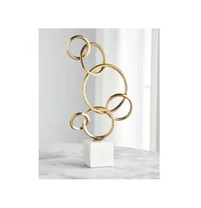 Sculpture moderne en métal plaqué or fabriquée à la main avec base blanche Sculpture d'accent de décoration d'intérieur en métal coulé en aluminium - Product Image 1
