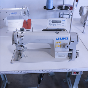 COMPRE AHORA Máquina de Coser Industrial JUKIS DDL 8700-7 con Mesa y Motor - Product Image 1