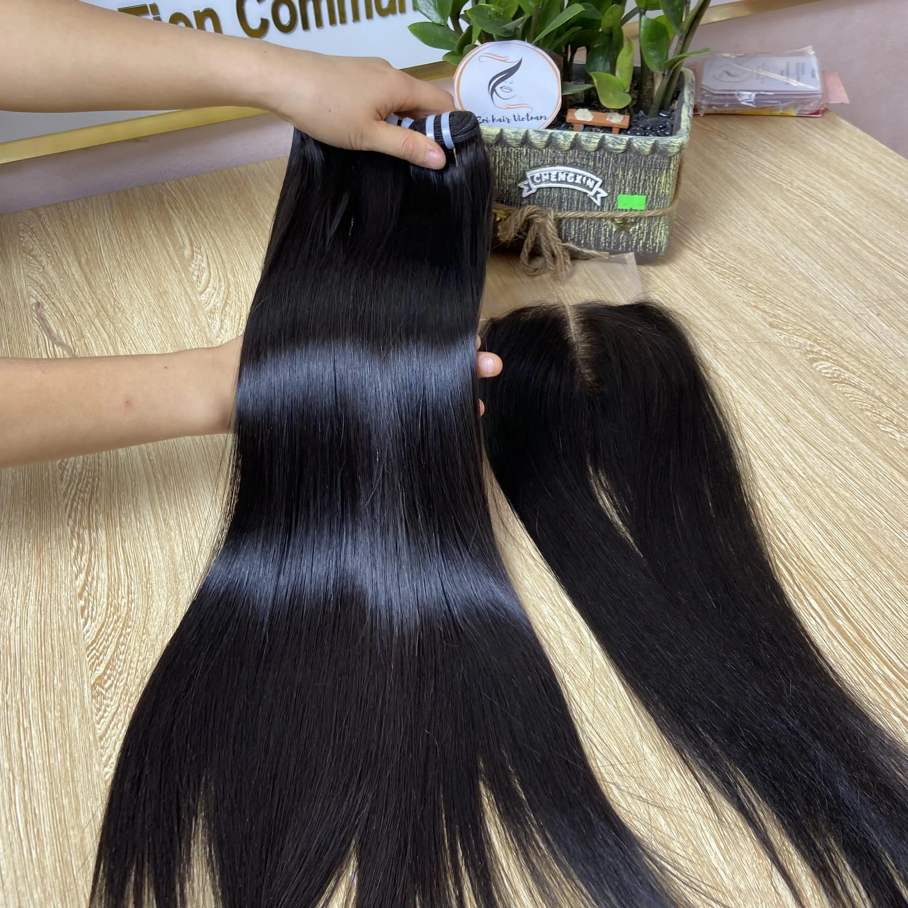 Wholesale human hair extension vendors high quality bone straight double drawn natural color hair made in Vietnam cheap price