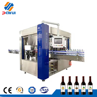 Machine d'étiquetage automatique rotative à haute vitesse pour étiquettes autocollantes, idéale pour les lignes de production de bouteilles alimentaires et de boissons