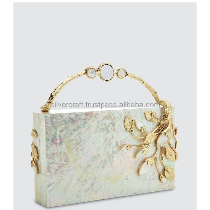 Custom made resin purses and clutches with embellishments ideal for resale by fashion accessory stores