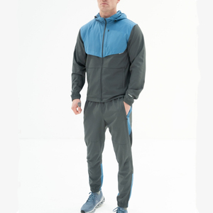 Ensemble survêtement pour homme en gros, veste coupe-vent imperméable à séchage rapide, pantalon bleu, style décontracté pour l'hiver - Product Image 1