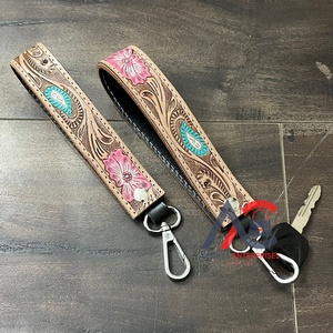 Nouveautés Porte-clés en cuir travaillé à la main avec dragonne, design de luxe, accessoires pour femmes - Product Image 1