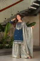 Ensemble élégant en géorgette avec broderie et sequins, doublure en coton, comprend un haut stylé, un pantalon palazzo et un dupatta pour une tenue ethnique gracieuse.