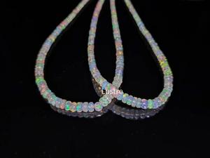 ลูกปัดโอปอลไฟเอธิโอเปียทรงรอนเดลล์เจียระไนทำมือ เกรด AAA+ |   สายไฟยาว 16 นิ้ว |   หินธรรมชาติ 100% |   ได้รับการรับรองจากบุคคลที่สาม - Product Image 5