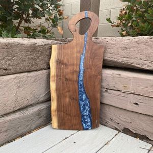 Unique resin chopping <b>board</b> crafted with golden resin tone and strong hardwood base suitable for gourmet kitchen experience - Product Image 1