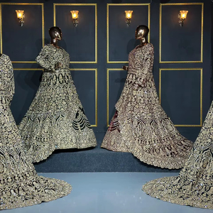 Royal Taaj Velvet Lehenga avec un travail de pierre élégant et un motif élégant, parfait pour les occasions spéciales - Product Image 1