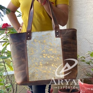 กระเป๋าโท้ทสำหรับผู้หญิงทำจากหนังแท้สีเมทัลลิกทำจาก2024 OEM ออกแบบได้ตามต้องการ - Product Image 1