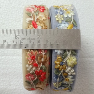 Cintas bordadas a máquina hechas a medida en diseños florales y en dos colores para vestidos de novia en 1 pulgada de ancho en tela de red. - Product Image 6