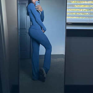 Vêtements de détente femmes 2 pièces ensemble tenues manches longues hauts pli pantalon évasé col rond t-shirts pantalon ensemble Pjs 2 pièces salon ensemble - Product Image 2