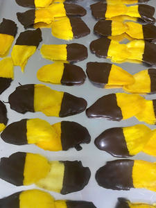 Enjoy pineapple <b>dried</b> <b>fruit</b> coated in decadent black chocolate paired with juicy mango in vanilla perfection. - Product Image 3