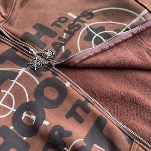 เสื้อฮู้ดผ้าฝ้าย100% แบบมีซิปรูดทรงโอเวอร์ไซส์โลโก้ออกแบบได้ตามต้องการสำหรับฤดูหนาว - Product Image 5