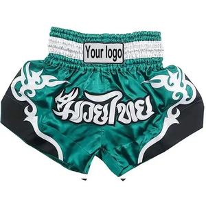 Pantalones cortos MMA al por mayor con etiqueta impresa personalizada y logotipo OEM artes marciales de lucha para uso en el gimnasio pantalones cortos para hombre - Product Image 1