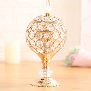 Hermoso quemador de incienso de metal y cristal personalizado en diseños ornamentados de color oro rosa que cuentan historias de artesanos y antepasados - Product Image 6