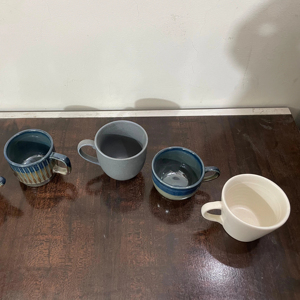 Vintage Style Handmade Porcelain Coffee Mug with Solid Pattern Reactive Glaze Comfortable Handle for Daily Use - Product Image 1