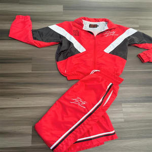 Vêtements de sport pour hommes et femmes, coupe-vent, survêtement, design à panneaux, pantalon large à rayures, veste zippée, prix de gros d'usine - Product Image 1