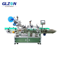 Machine d'étiquetage horizontale entièrement automatique à enveloppement complet |   Applicateur haute vitesse pour bouteilles rondes, boîtes et contenants cylindriques