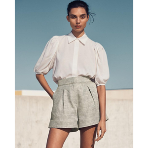 Camisa de fabricante de moda de Vietnam para mujer OEM ODM Material sostenible Ajuste personalizado Aspecto elegante Prenda lavable lista - Product Image 5