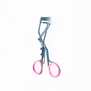 Ergonomic eyelash <b>curler</b> engineered for gentle lash lift results with innovative curved frame and safety pads. - Product Image 6