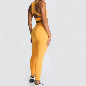 Nouveau design ensemble de yoga professionnel respirant à séchage rapide pour femmes vente en gros ensemble de yoga pour femmes de couleur unie - Product Image 3
