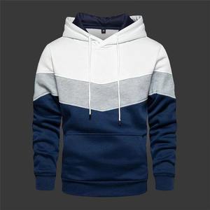 Sudadera con capucha deportiva informal para hombre y mujer de calle azul de otoño e invierno con bolsillos de costura lateral sueltos y Sudadera con capucha juvenil de color bloqueado - Product Image 6