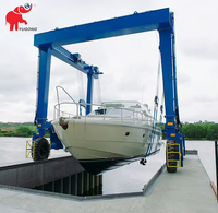 Grue hydraulique mobile certifiée CE pour bateaux, idéale pour la réparation de yachts, le transport et le mise à l'eau des bateaux en quai.