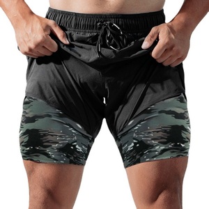Pantalones cortos de gimnasio de calle alta para hombre, Bermudas sólidas transpirables de poliéster y LICRA con dobladillo dividido activo con logotipo personalizado para Fitness deportivo - Product Image 6