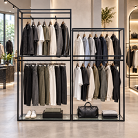 Portants à vêtements noirs robustes et peu encombrants, réglables, pour la mode masculine et féminine, de style boutique sur mesure