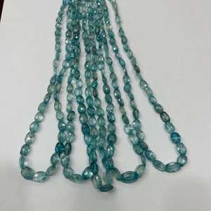 ลูกปัดรูปไข่เซอร์คอนสีฟ้าธรรมชาติคุณภาพอัญมณีเพทายสีฟ้าลูกปัดรูปไข่ทำด้วยมือจำนวนมากสินค้าจำนวนมาก - Product Image 1