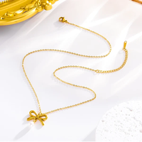 En gros Petit Tempérament Frais Noeud Papillon Perle Artificielle Boucles D'oreilles et Collier pour Femmes Bijoux De Mode Coréenne