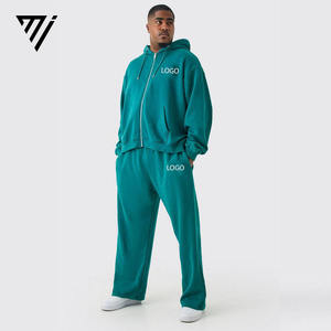 Ensemble survêtement oversize vert forêt, sweat-shirt ample à col rond et épaules tombantes, et pantalon de survêtement évasé à coupe bootcut - Product Image 1