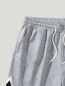 Pantalones cortos de gimnasio para hombre baratos al por mayor, pantalones cortos de entrenamiento físico de malla de playa de secado rápido con bolsillos de talla grande, cintura estampada de poliéster liso - Product Image 3