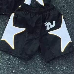 Vente en gros personnalisé OEM hommes ensemble léger vêtements de rue nylon polyester survêtements ensemble coupe-vent pour hommes - Product Image 4