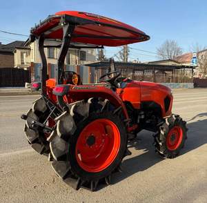 Tractor compacto Kubota para jardín con cargador frontal en Austria - Product Image 1