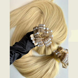 Extensions de cheveux naturels vietnamiens à la technique TAPE IN avec texture naturelle, approvisionnement en vrac - Product Image 1