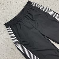 Nouveau style pantalon de survêtement en nylon pour homme, streetwear vintage d'hiver, coupe ample évasée, avec dentelle, perles et finition peinte imperméable