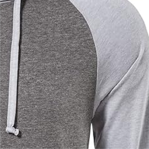 Vert émeraude, blanc et anthracite. Un haut vert vibrant avec un centre blanc épuré et un gris foncé. - Product Image 5