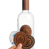 Étiquettes de bouteille de vin de luxe autocollants en cuir ronds imperméables imprimés personnalisés pour les couvertures de cou d'emballage de bouteilles en verre