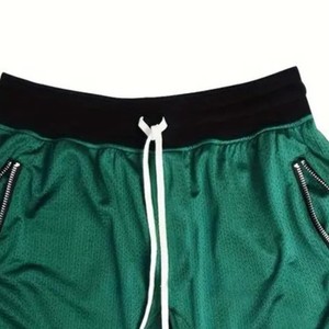 Custom Green Basketball Shorts With Black Waistband White Trim And Zipper Pockets Breathable Mesh <b>Athletic</b> Sportswear - Product Image 2
