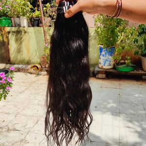 Cheveux humains vierges Extension de cheveux Natura bouclés en vrac Vente chaude non traitée indienne 100% Remy Extension de cheveux humains Natural Wave. - Product Image 1