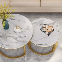 Table d'appoint ronde en métal noir doré avec plateau en céramique à texture marbrée pour salon