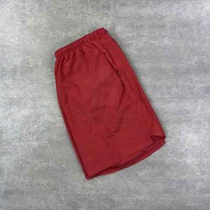 Ensemble de survêtement coupe-vent léger et à séchage rapide 2-en-1 pour femme avec logo frontal, veste à capuche et short en polyester/nylon pour la course - Product Image 4
