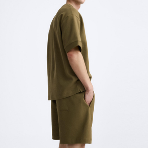 ชุดกีฬากางเกงขาสั้นสำหรับผู้ชายเสื้อยืดและกางเกงขาสั้นผ้าทอสำหรับออกกำลังกายในยิมฤดูร้อนโลโก้ออกแบบได้ตามต้องการ - Product Image 1