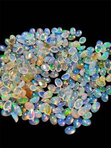 Cabujones de ópalo natural etíope 4x6mm Piedras preciosas sueltas blancas ovaladas Varias cantidades disponibles - Product Image 3