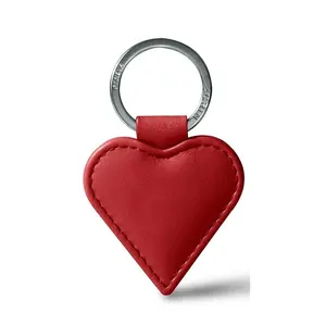 حلقة مفاتيح على شكل قلب من الجلد الناعم والحبوب الكاملة بسلسلة مفاتيح