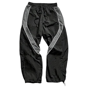 กางเกงขายาวลำลองผู้ชายสไตล์สตรีท ใส่สบาย น้ำหนักเบา ทรงหลวม ขากว้าง ผ้าไนลอน แต่งแถบสะท้อนแสง - Product Image 1